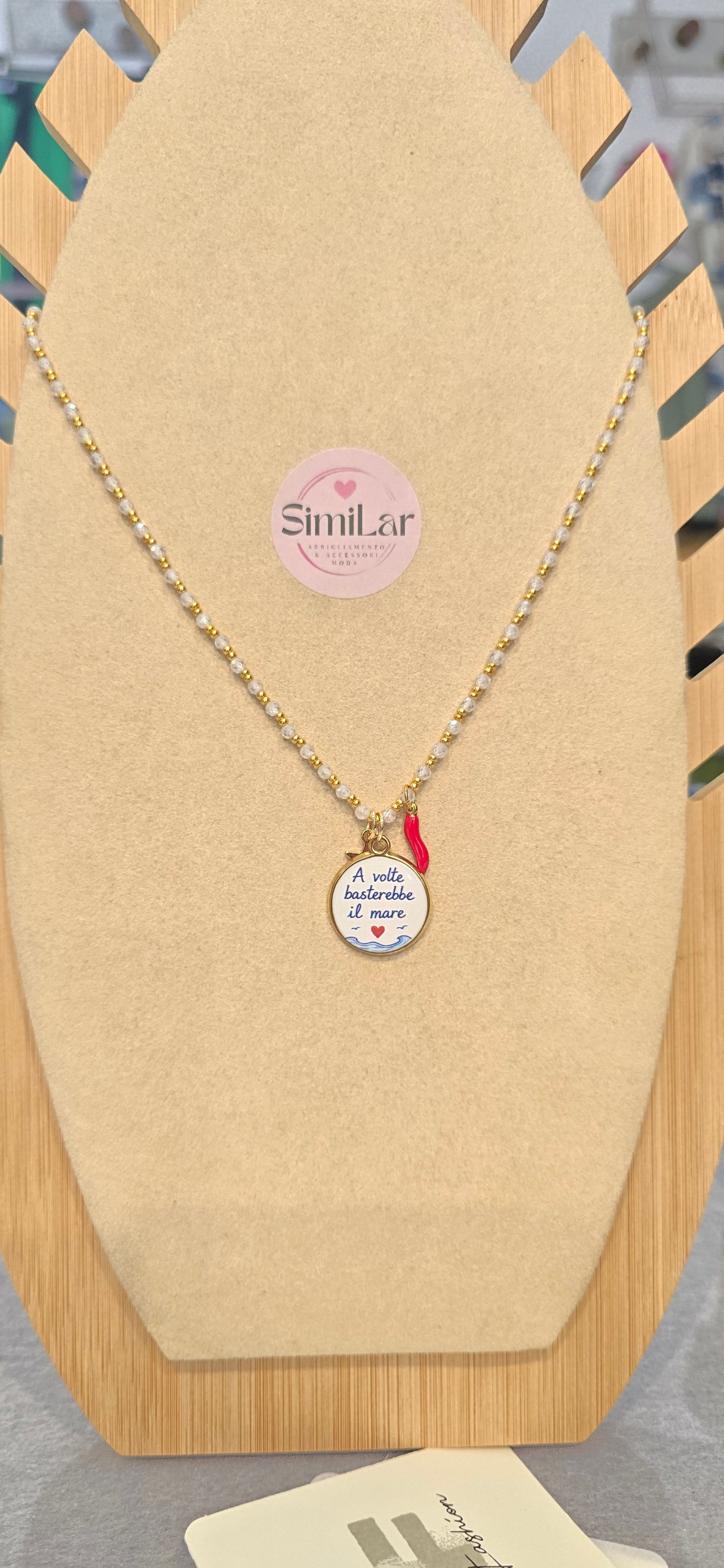 # Collana CRISTALLINI bianca " a volte basterebbe il mare" 3 charms